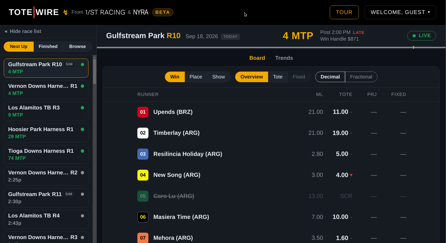 The vertical race list: a full-height column down the left, each race with its minutes to post, beside a live board.
